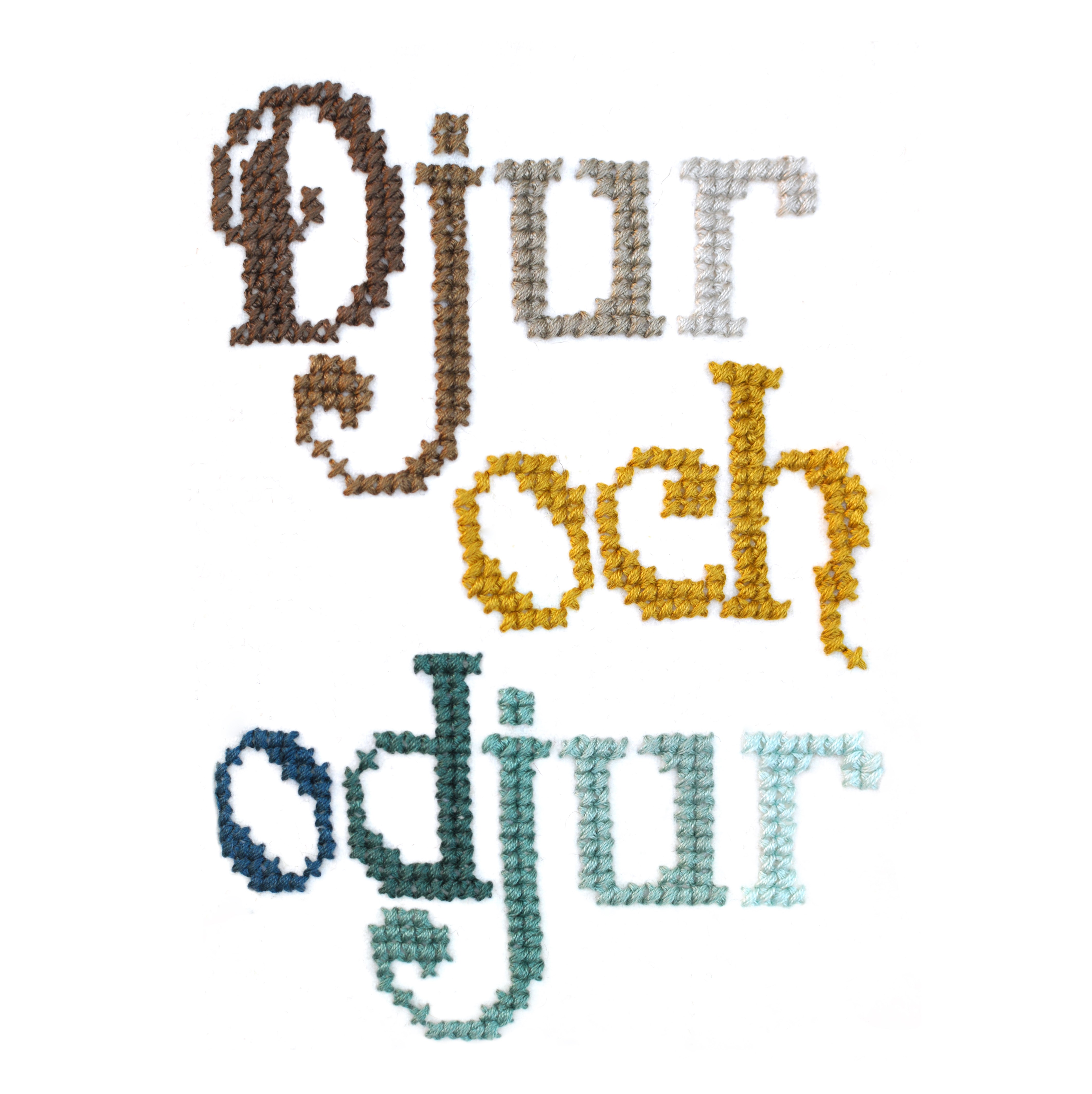 "Djur och odjur" broderat i korsstygn